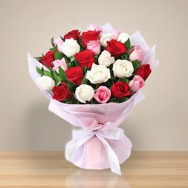 A bouquet of mixed color roses including red, white, and pink roses