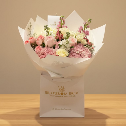 mixed flower bouquet with light pink hydrangea, pink roses and white and pink mathiola, available for same-day delivery in Dubai