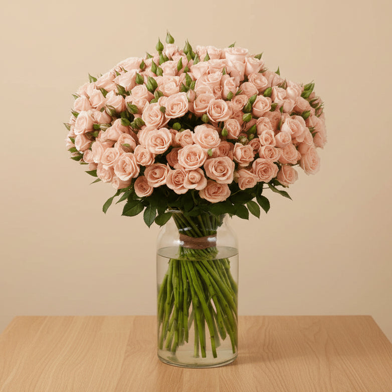 Elegant peach spray roses in a luxury vase – premium floral arrangement Dubai