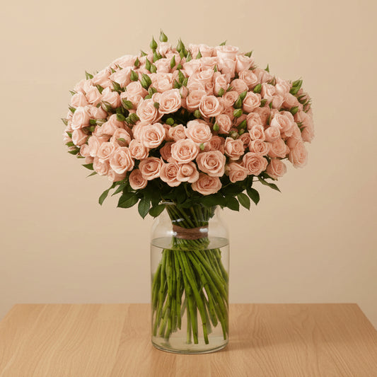 Elegant peach spray roses in a luxury vase – premium floral arrangement Dubai