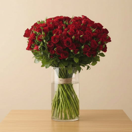 Fresh red spray roses arranged in a vase – romantic flower gift delivery Dubai