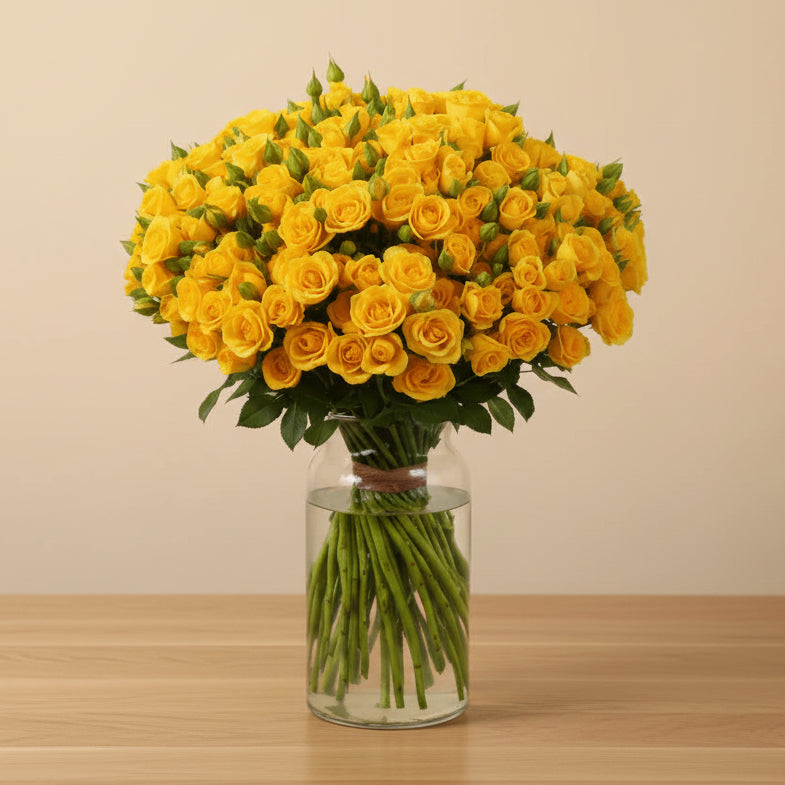 Vibrant yellow spray roses in a vase – cheerful flower delivery Dubai