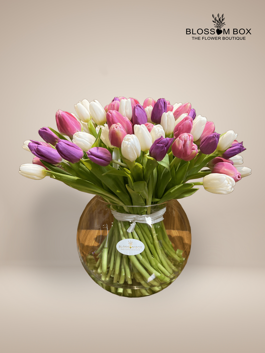 Mixed Color Tulips In A Vase